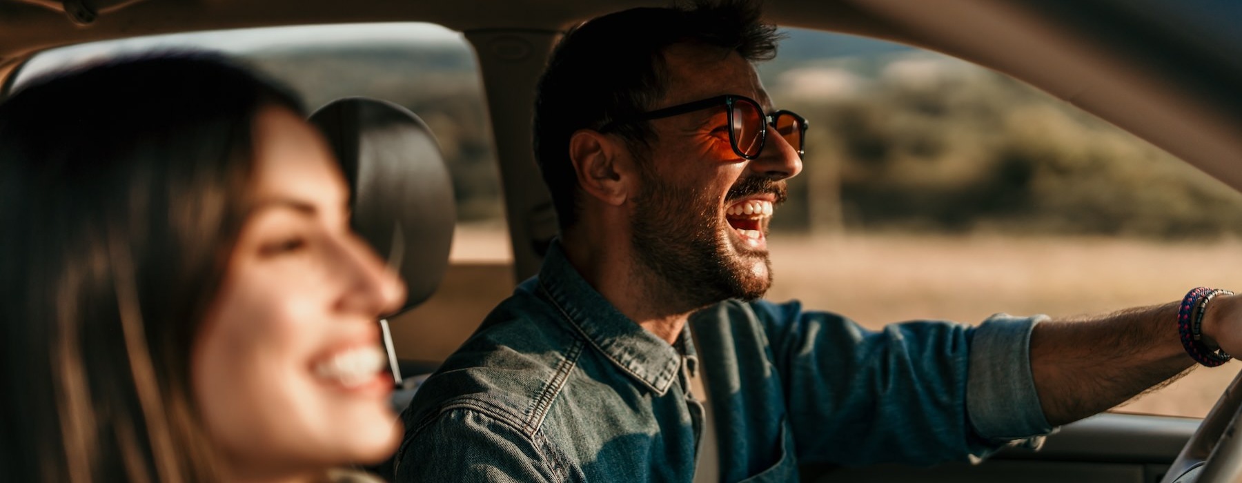 a man and woman in a car